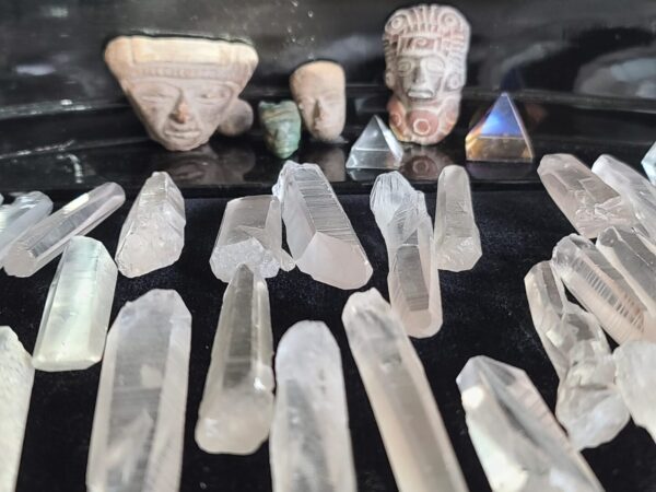A table with many different types of crystal.