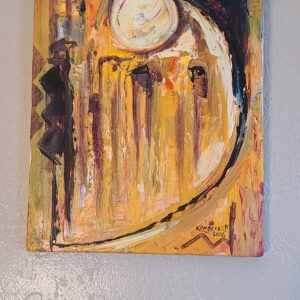 A painting of an abstract scene on the wall.
