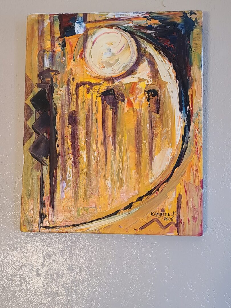 A painting of an abstract scene on the wall.